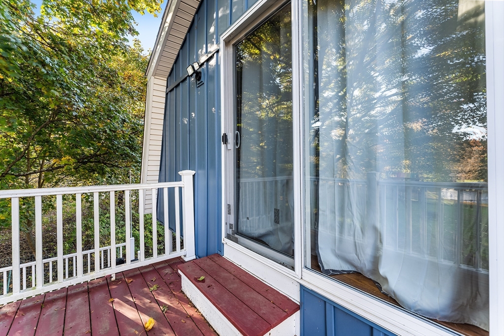 1052 Providence Road Northbridge, MA 01588 - Photo 31 of 42 a view of balcony with wooden floor