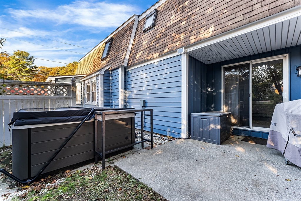 1052 Providence Road Northbridge, MA 01588 - Photo 35 of 42 a view of a patio with a table and chairs