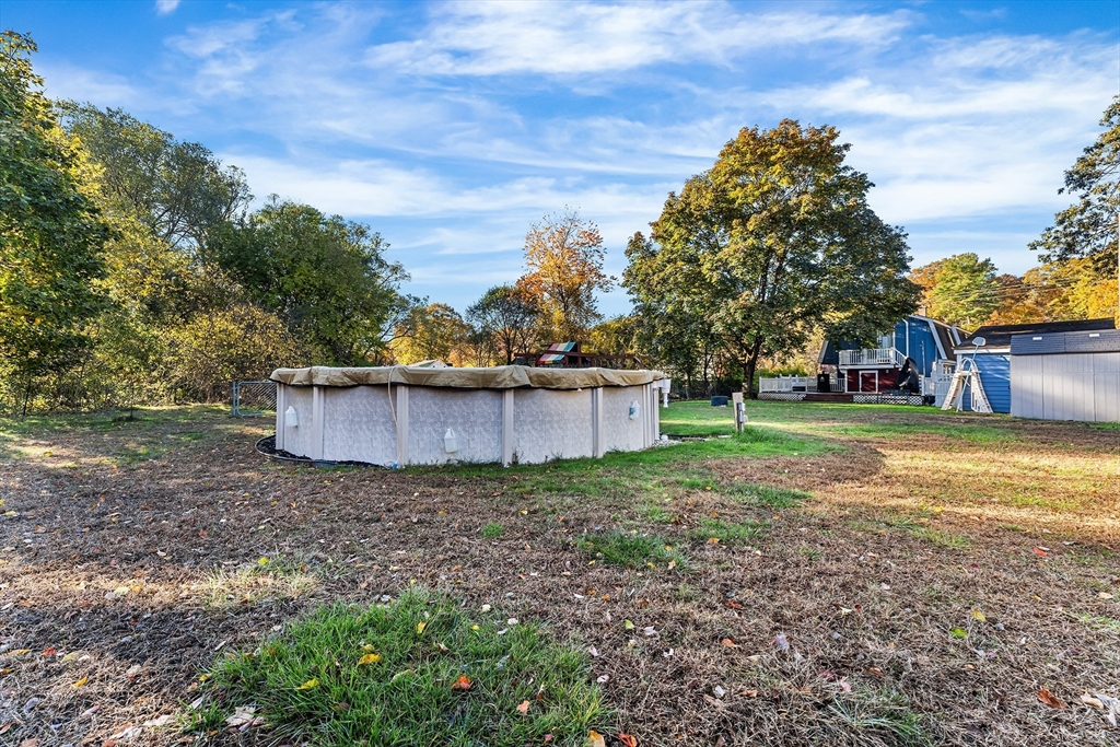 1052 Providence Road Northbridge, MA 01588 - Photo 37 of 42 a view of a house with backyard and trees