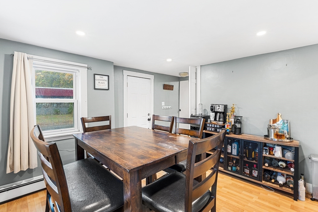 1052 Providence Road Northbridge, MA 01588 - Photo 6 of 42 a view of a dining room with furniture window and wooden floor
