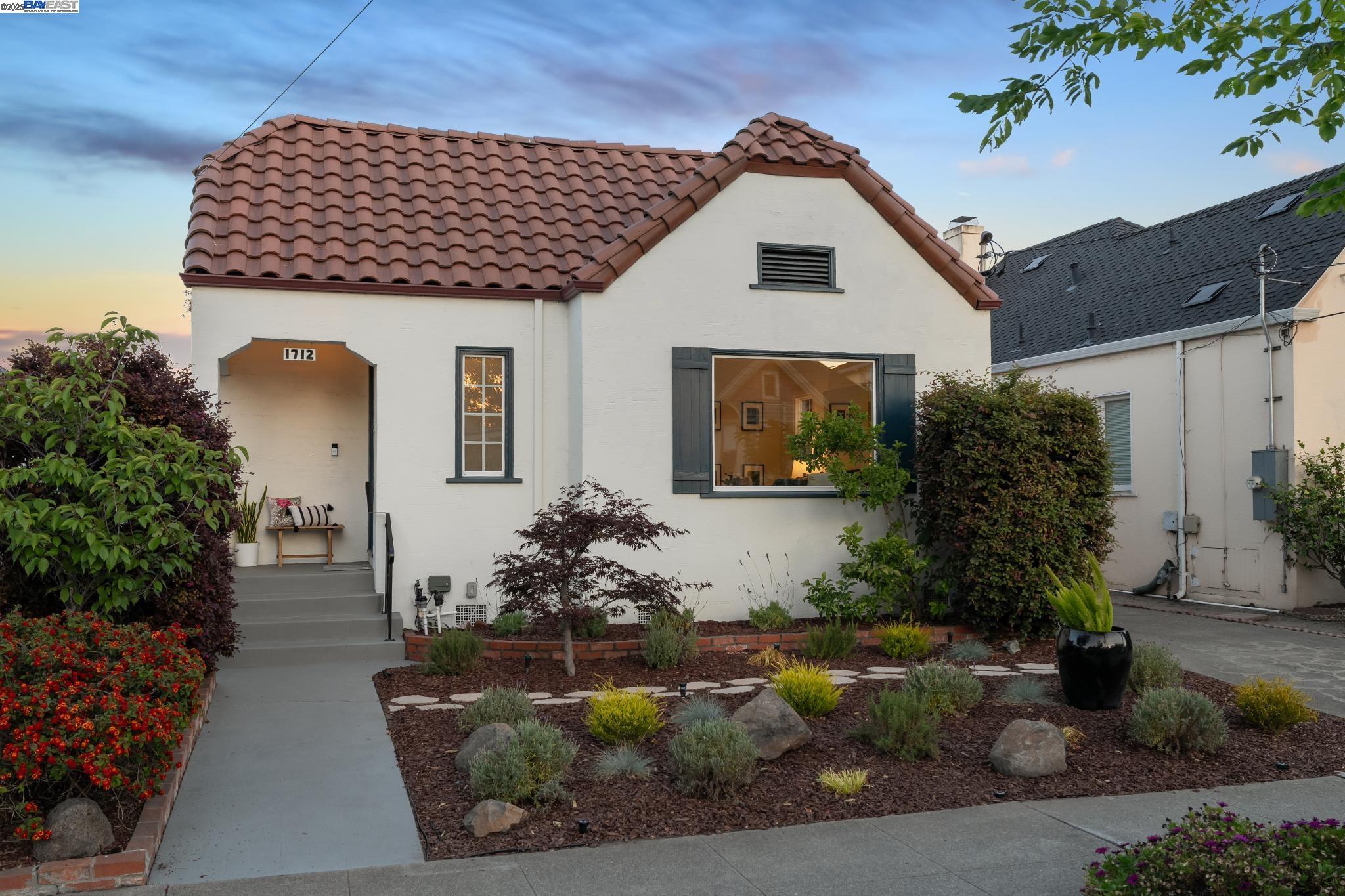 1712 Broadway Alameda, CA 94501 - Photo 1 of 1 a front view of a house with garden