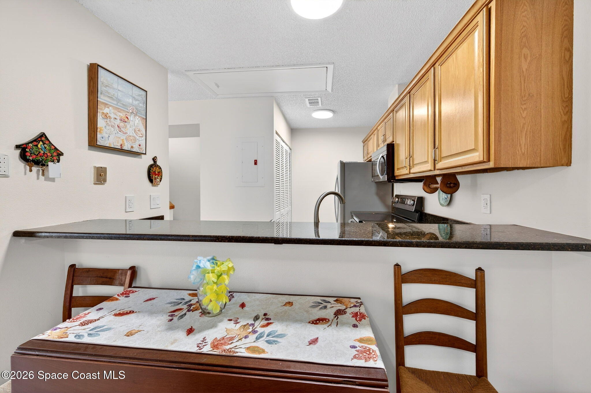 1400 Sheafe Avenue Northeast, Unit 110 Palm Bay, FL 32905 - Photo 13 of 35 a view of kitchen with furniture and appliances