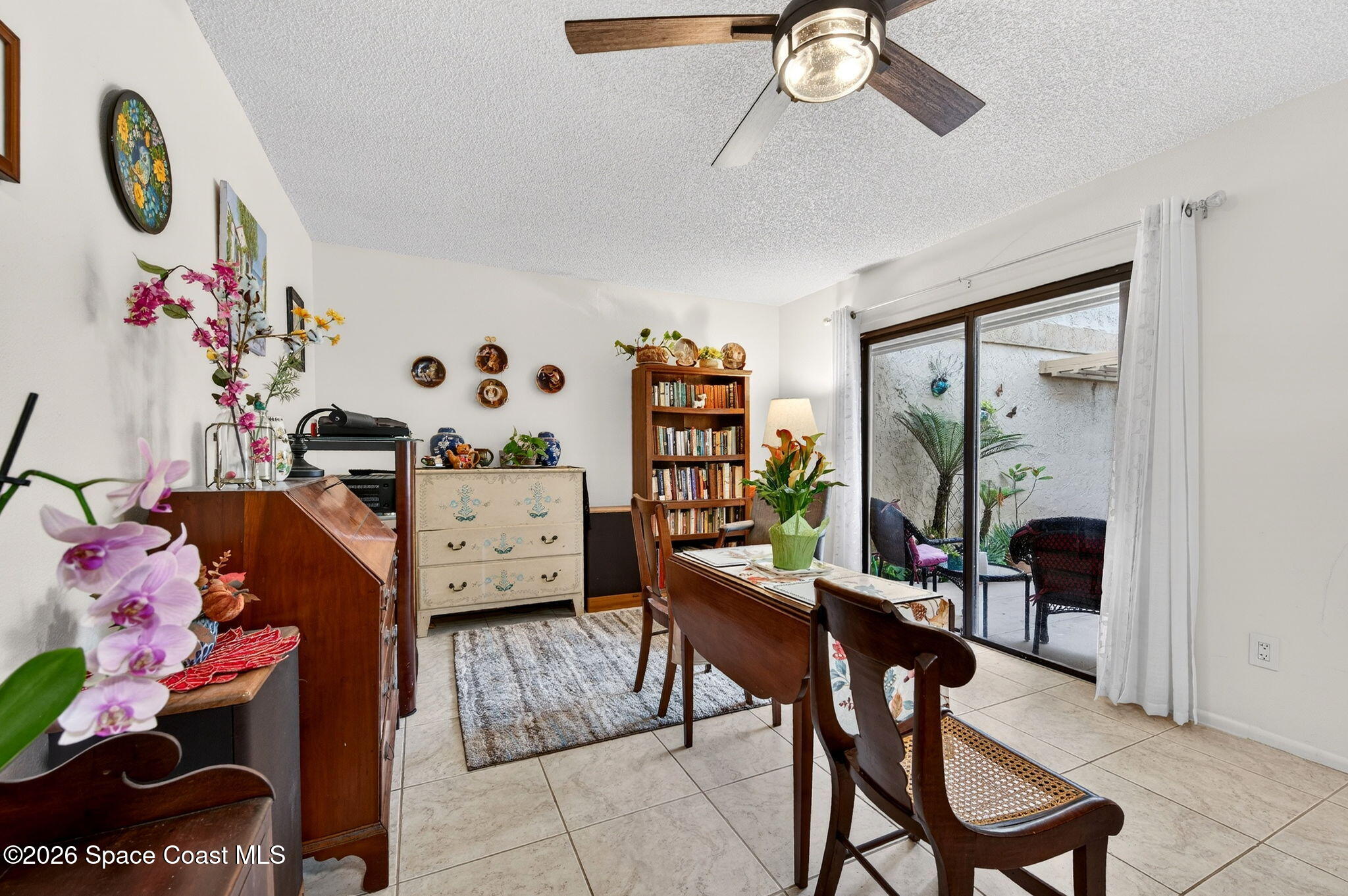 1400 Sheafe Avenue Northeast, Unit 110 Palm Bay, FL 32905 - Photo 16 of 35 a workspace with furniture and wooden floor