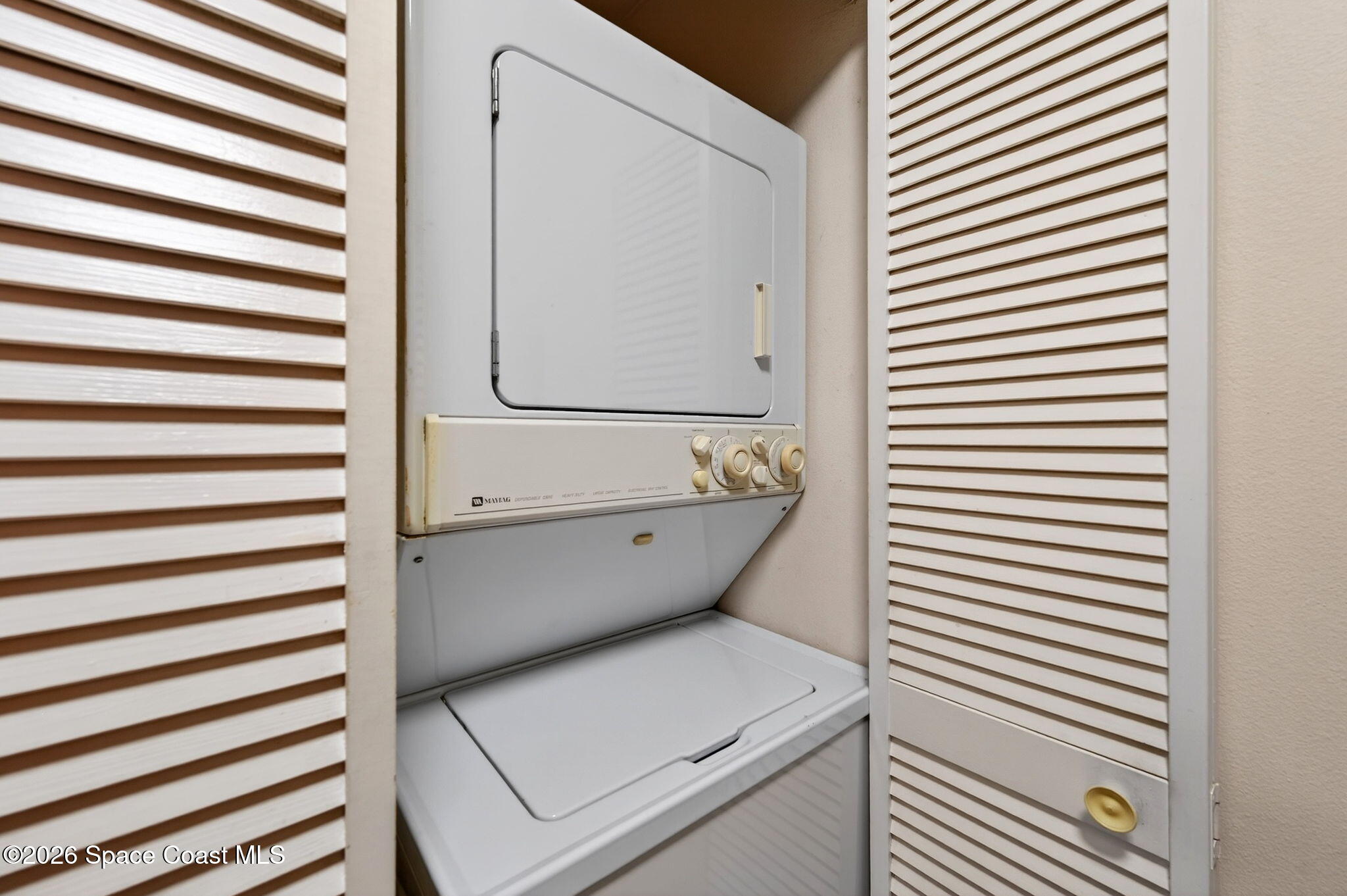 1400 Sheafe Avenue Northeast, Unit 110 Palm Bay, FL 32905 - Photo 20 of 35 a view of washer and dryer