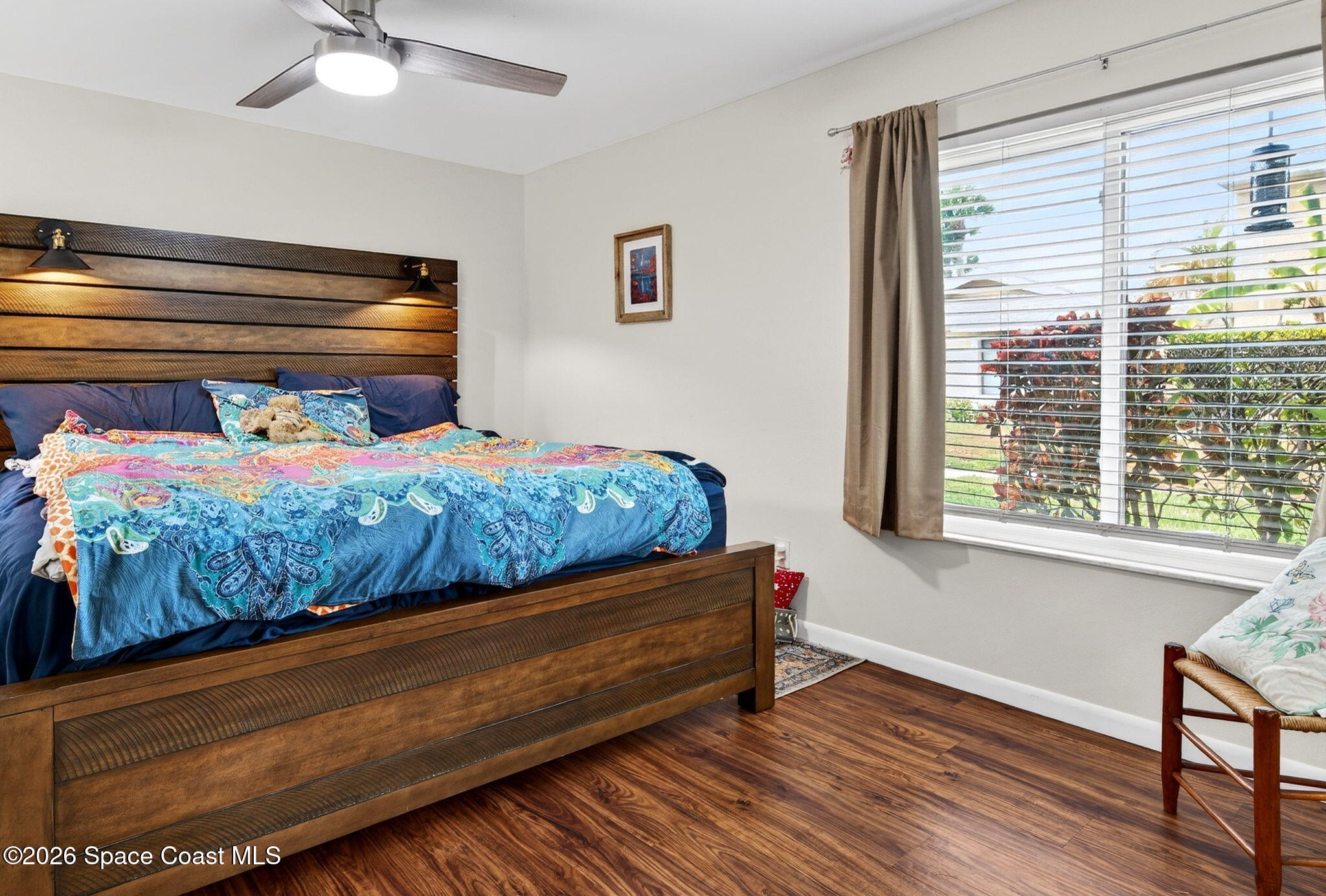 1400 Sheafe Avenue Northeast, Unit 110 Palm Bay, FL 32905 - Photo 22 of 35 a bedroom with a bed and a window