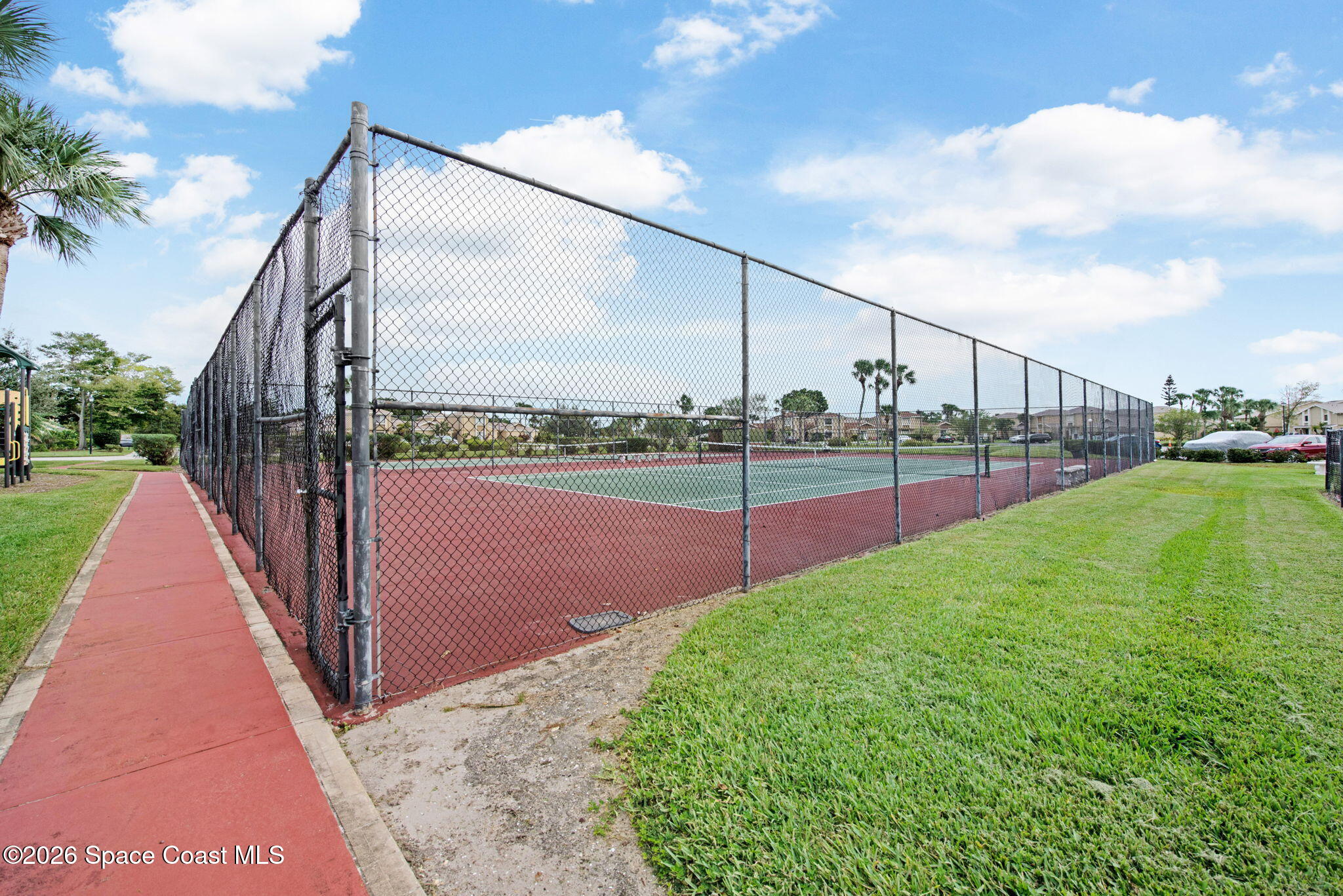 1400 Sheafe Avenue Northeast, Unit 110 Palm Bay, FL 32905 - Photo 34 of 35 a view of a outdoor space