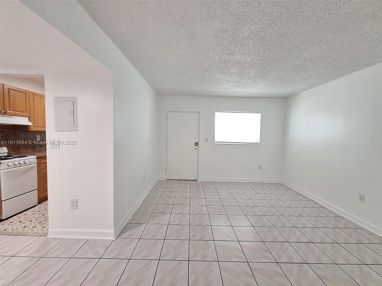 2011 Bay Drive, Unit 3 Miami Beach, FL 33141 - Photo 6 of 14 a view of an empty room and window
