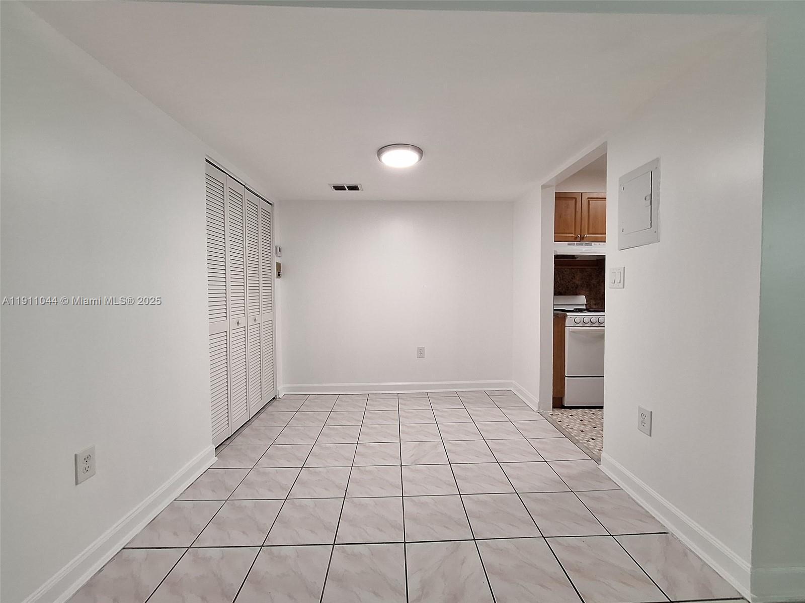 2011 Bay Drive, Unit 3 Miami Beach, FL 33141 - Photo 7 of 14 a view of an empty room and window
