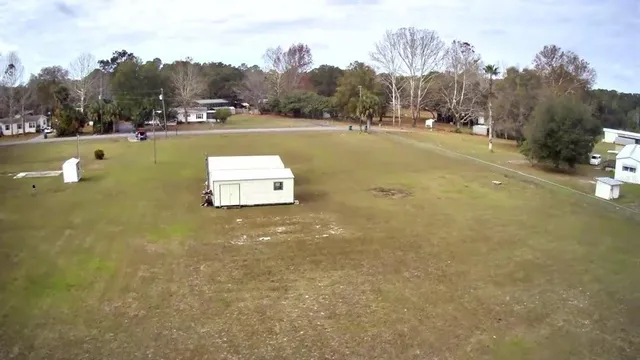 a view of a lake with trees