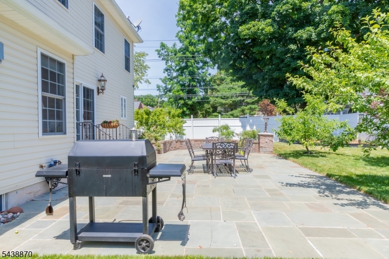 419 Putnam Road Union, NJ 07083 - Photo 6 of 37 a view of a patio with a table and chairs