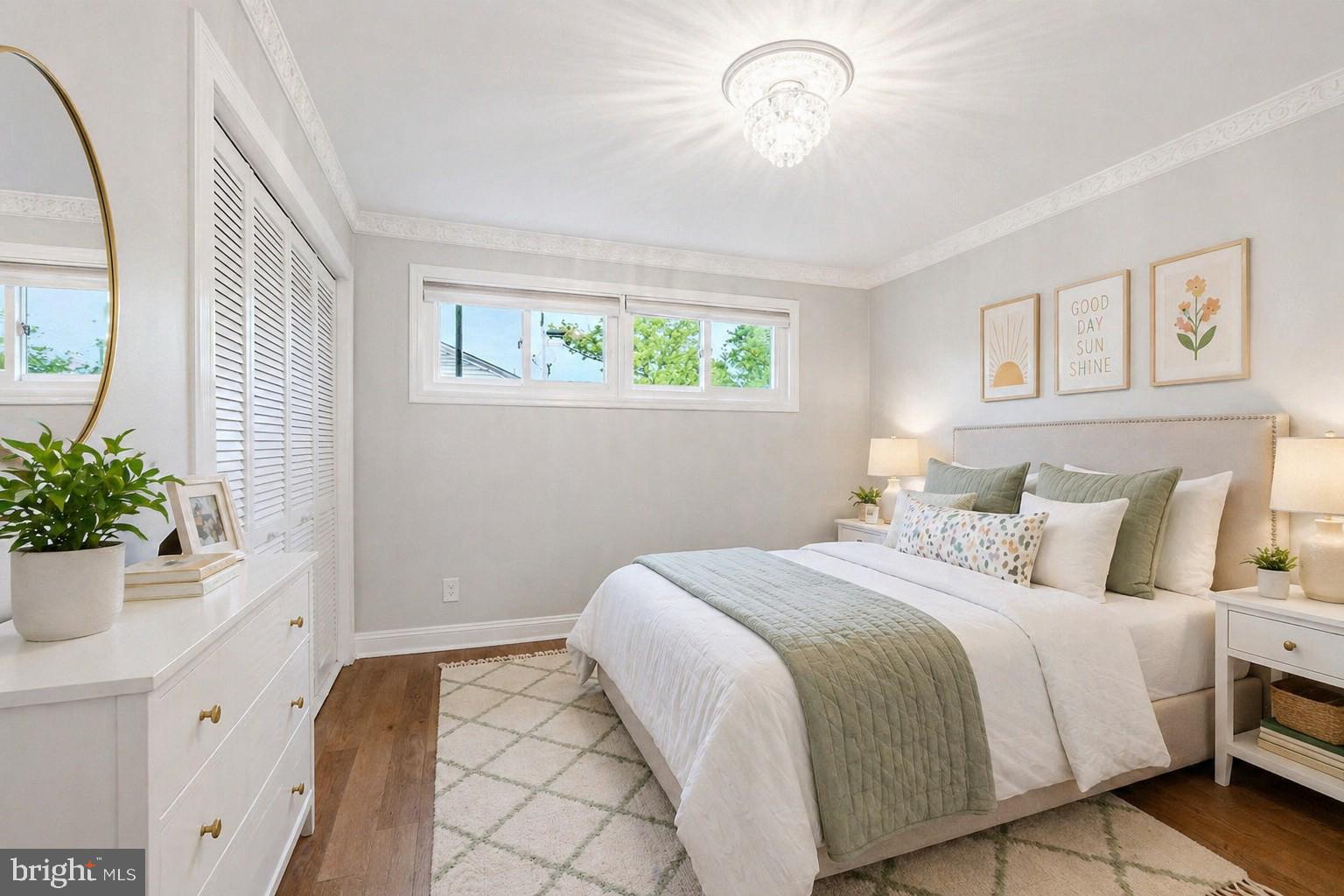5807 Accomac Street Springfield, VA 22150 - Photo 12 of 50 a bedroom with a bed and a potted plant
