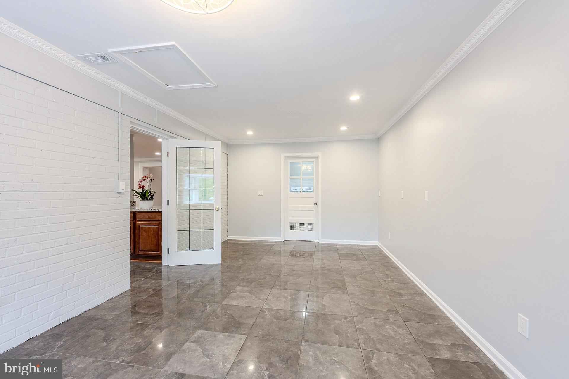 5807 Accomac Street Springfield, VA 22150 - Photo 31 of 50 a view of a big room with closet and windows