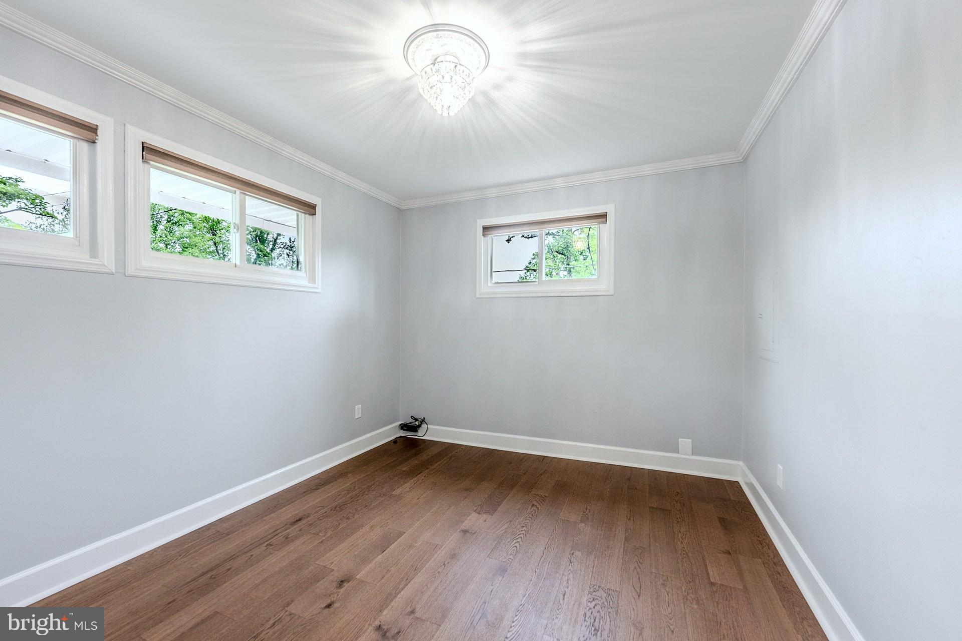 5807 Accomac Street Springfield, VA 22150 - Photo 37 of 50 an empty room with a window