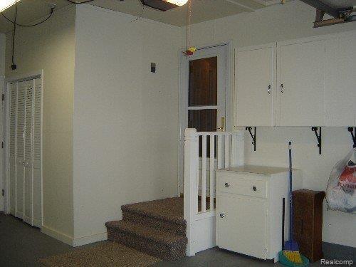 9250 Tower Road South Lyon, MI 48178 - Photo 10 of 13 Lots of storage in garage