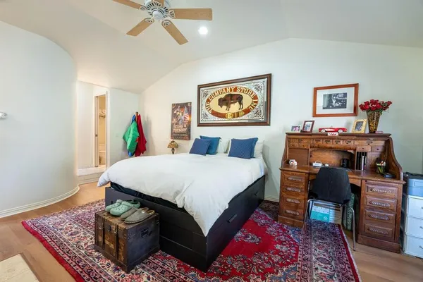 a bed room with a bed and a couch