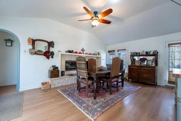 a living room with furniture and a rug