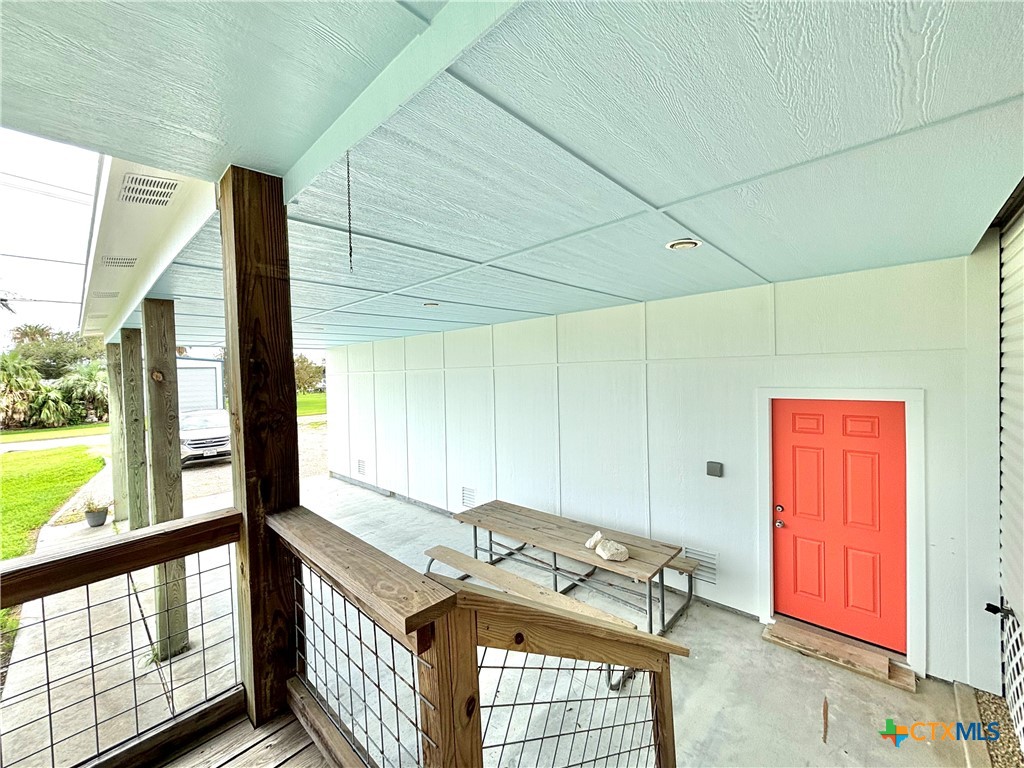 109 Washington Boulevard Port O'Connor, TX 77982 - Photo 13 of 23 a view of an empty room and window