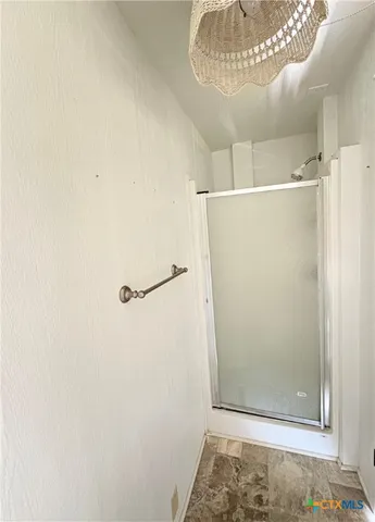 a bathroom with a toilet and a sink