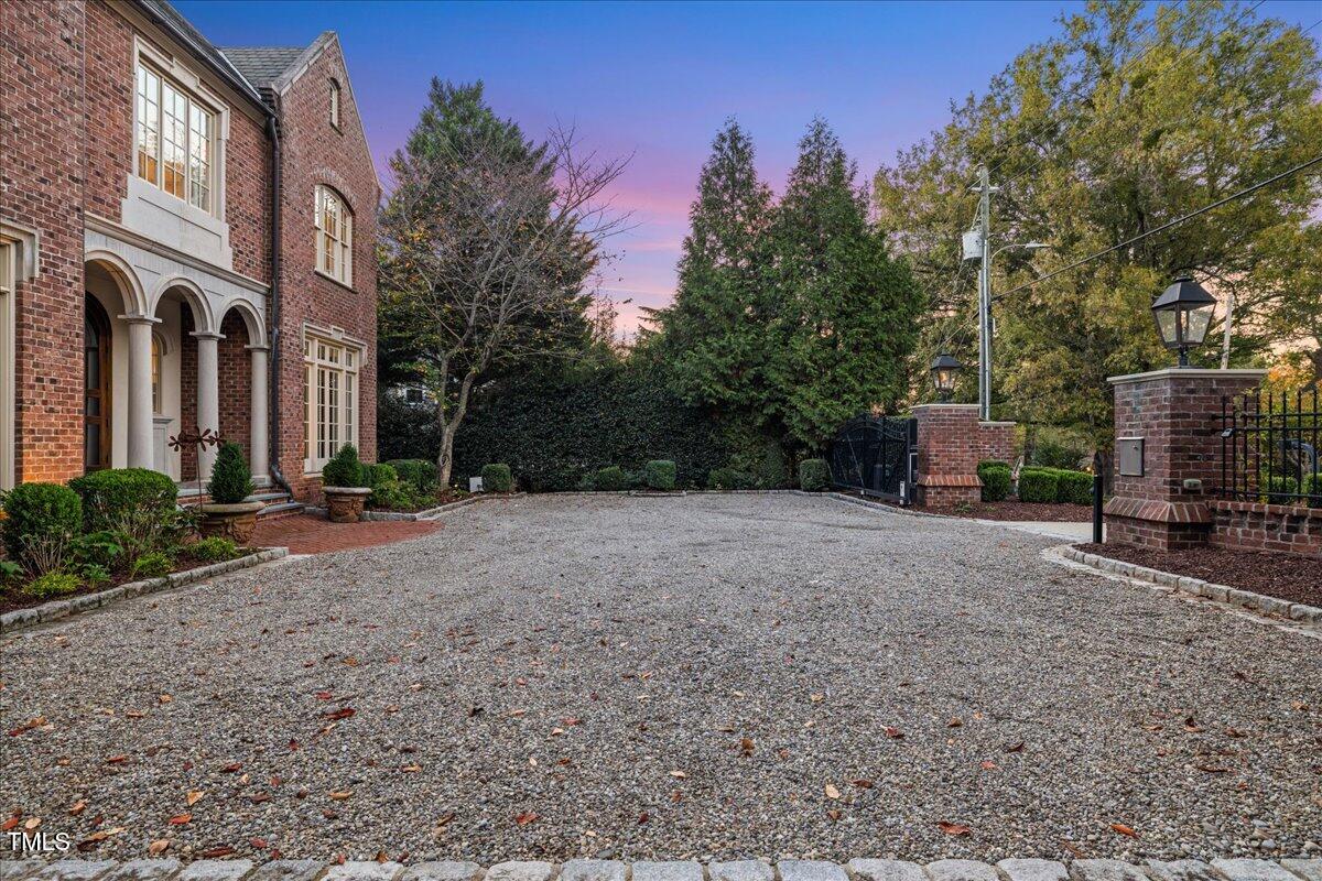 2627 Fairview Road Raleigh, NC 27608 - Photo 9 of 55 True English gravel courtyard for your friends and family vehicles