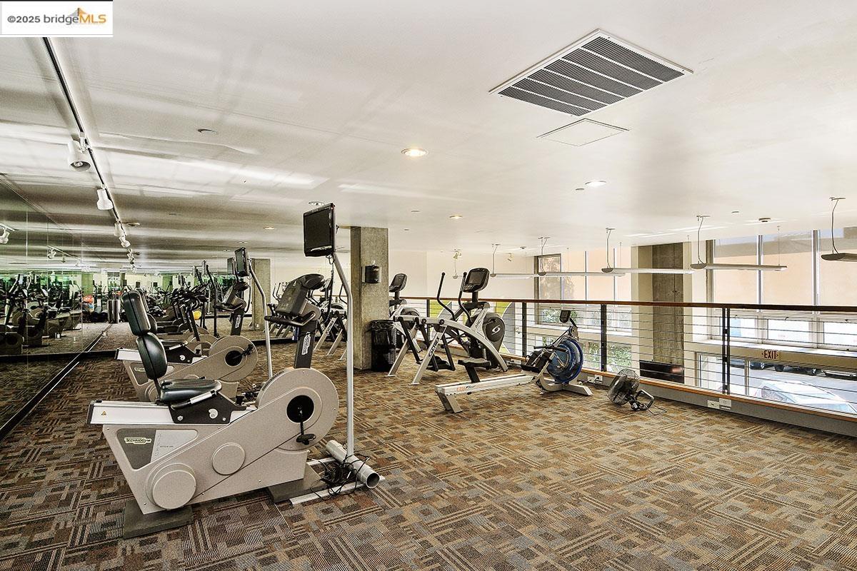 311 Oak Street, Unit 816 Oakland, CA 94607 - Photo 19 of 20 a view of a room with gym equipment