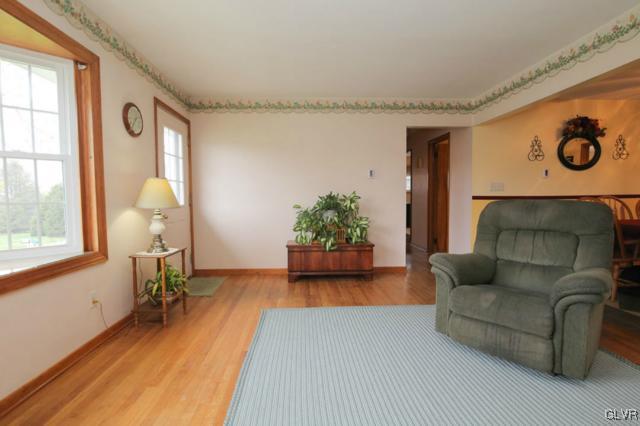 683 English Road Bath, PA 18014 - Photo 11 of 32 a living room with furniture and a window