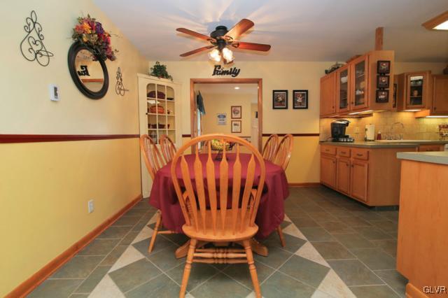 683 English Road Bath, PA 18014 - Photo 13 of 32 a view of a dining room with furniture and a chandelier