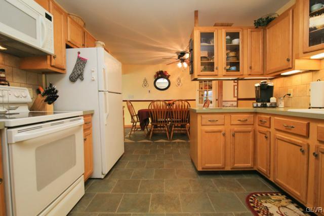 683 English Road Bath, PA 18014 - Photo 18 of 32 a kitchen with stainless steel appliances a stove a sink and a refrigerator