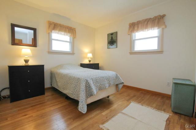 683 English Road Bath, PA 18014 - Photo 24 of 32 a bedroom with a bed and wooden floor