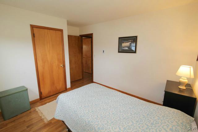 683 English Road Bath, PA 18014 - Photo 26 of 32 a bedroom with a bed and a lamp