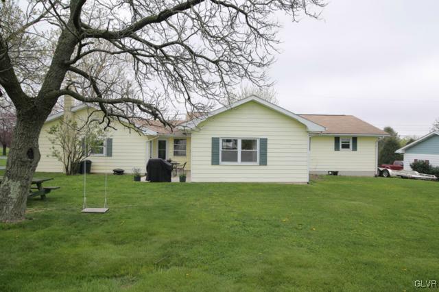 683 English Road Bath, PA 18014 - Photo 6 of 32 a front view of a house with a garden