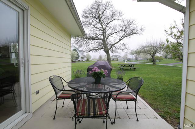683 English Road Bath, PA 18014 - Photo 8 of 32 a backyard of a house with table and chairs