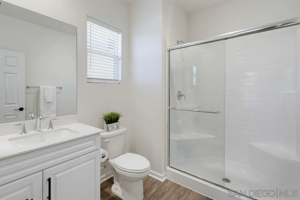1013 Crestline Road San Marcos, CA 92069 - Photo 23 of 58 Entry level bedroom with ensuite bathroom