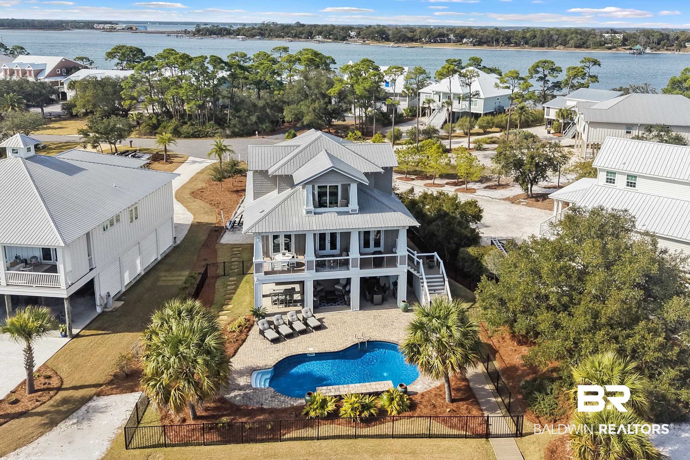 33186 Marlin Key Drive Orange Beach, AL 36561 - Photo 6 of 87 Aerial view of residential area featuring a nearby body of water