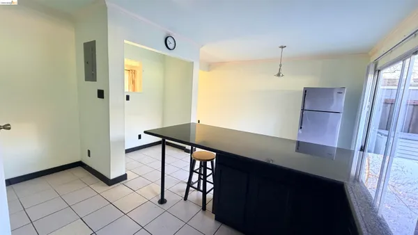 a view of a hallway with seating area