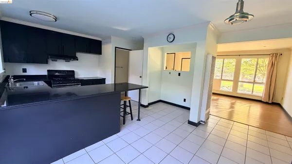 a view of a livingroom with furniture and a flat screen tv