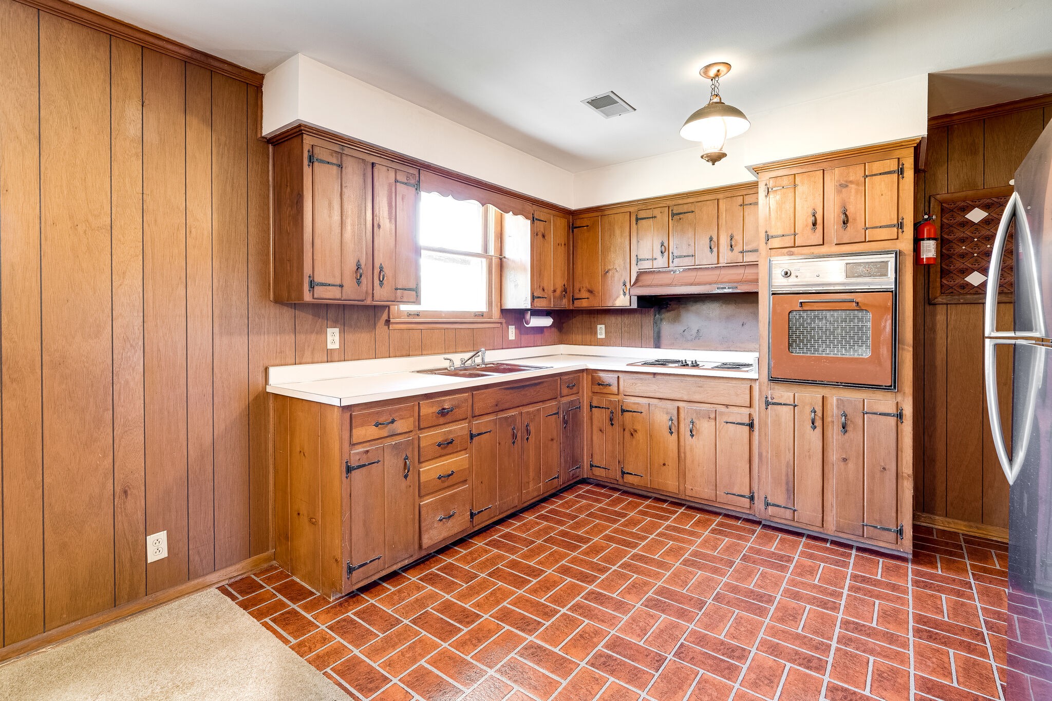 7524 Gary Road Joelton, TN 37080 - Photo 11 of 29 a kitchen with a stove sink and cabinets