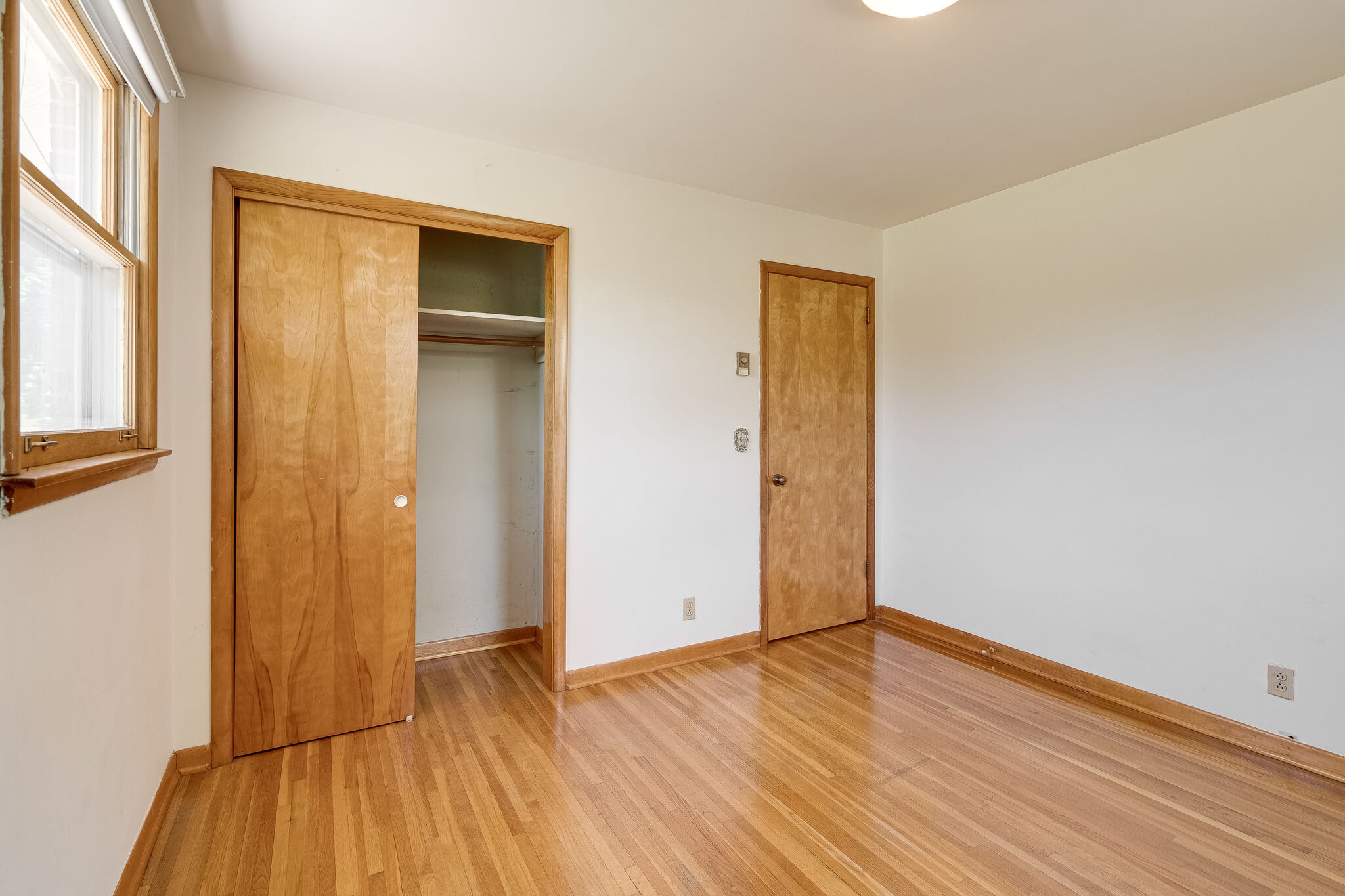 7524 Gary Road Joelton, TN 37080 - Photo 17 of 29 an empty room with wooden floor and windows
