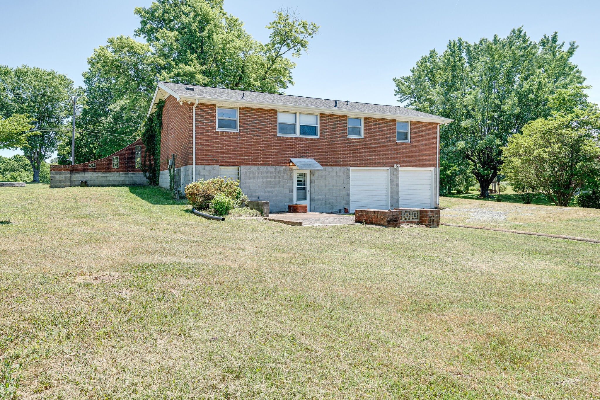 7524 Gary Road Joelton, TN 37080 - Photo 28 of 29 a front view of a house with a yard