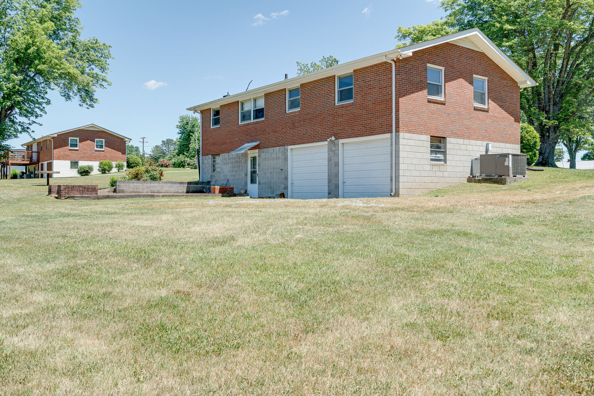 7524 Gary Road Joelton, TN 37080 - Photo 29 of 29 a front view of a house with a yard and garage