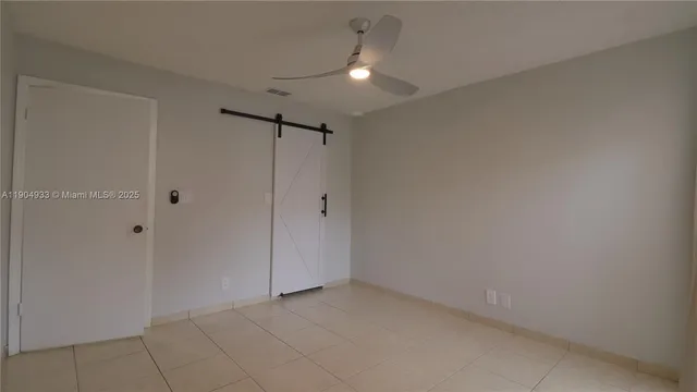 a bathroom with a mirror