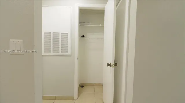 a bathroom with a sink shower and a toilet