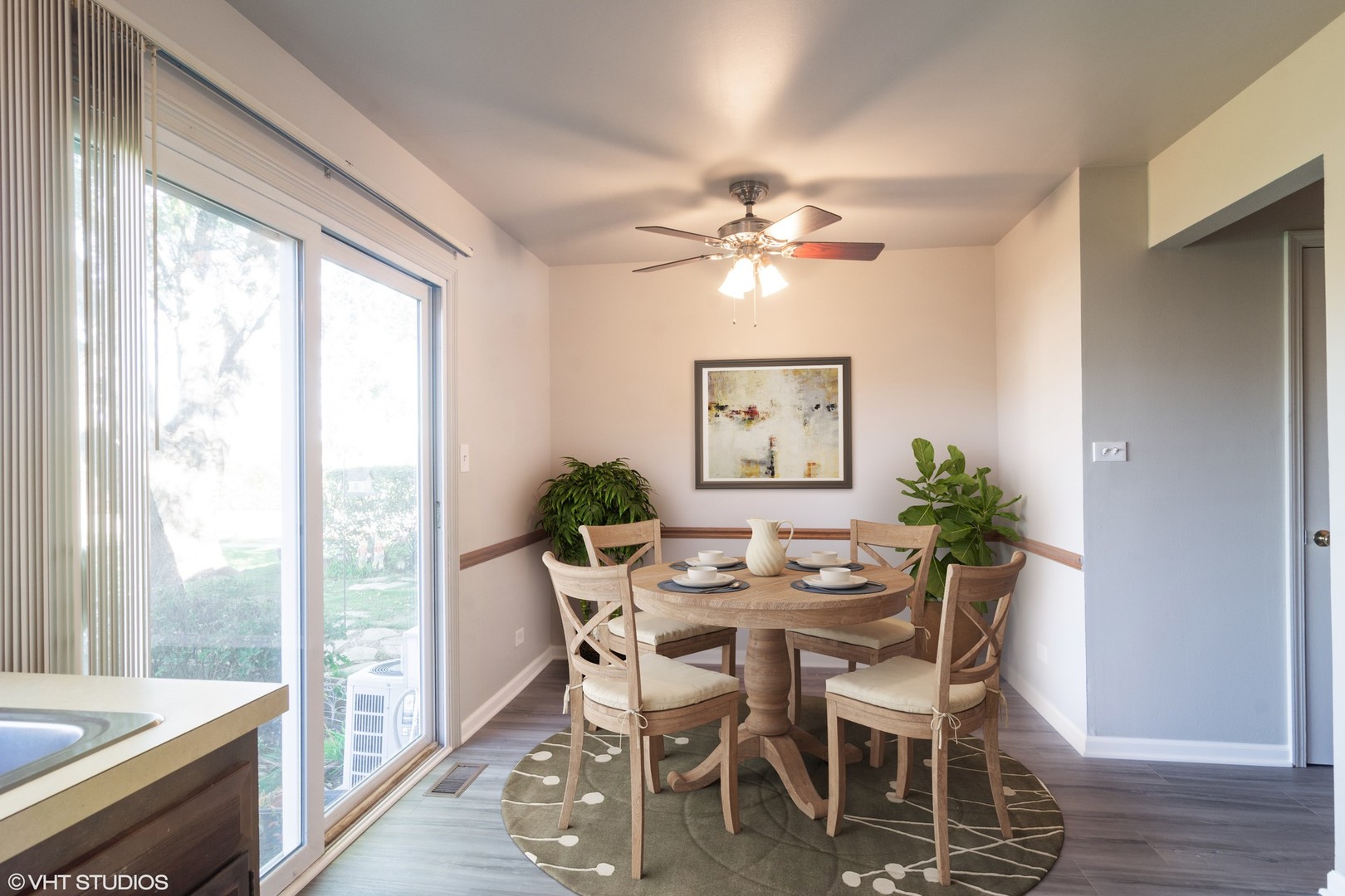 1992 Holbrook Lane Hoffman Estates, IL 60169 - Photo 5 of 14 a view of a dining room with furniture a chandelier and wooden floor