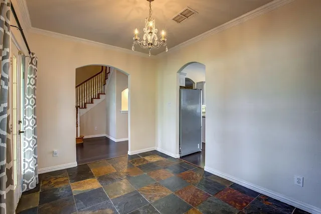 a view of a livingroom with balcony