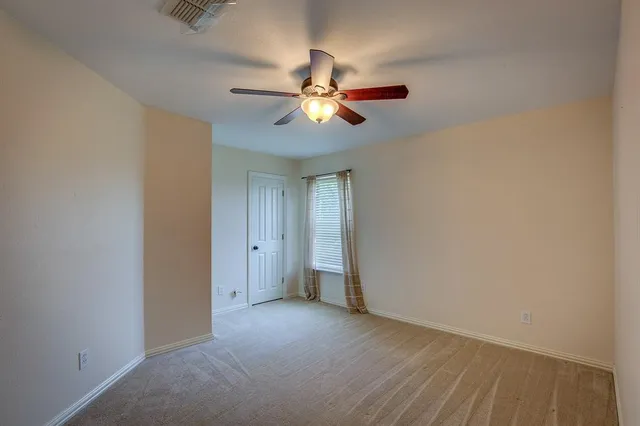 a bathroom with a sink mirror toilet and bathtub