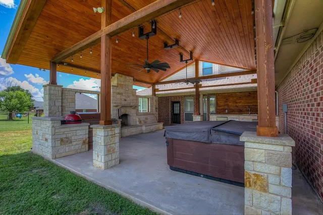 a outdoor view of a building with glass door and balcony