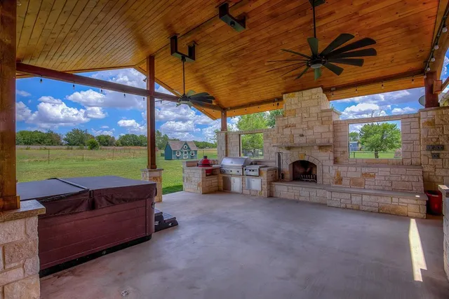 a view of a house with a big yard
