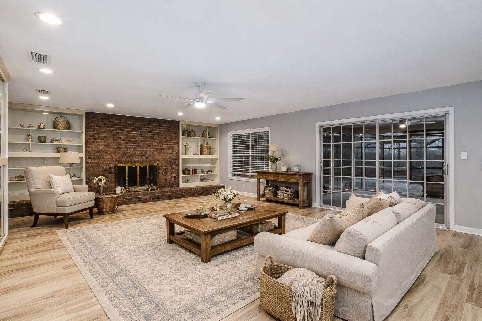 28175 Hammock Road Hilliard, FL 32046 - Photo 16 of 33 a living room with furniture and a fireplace