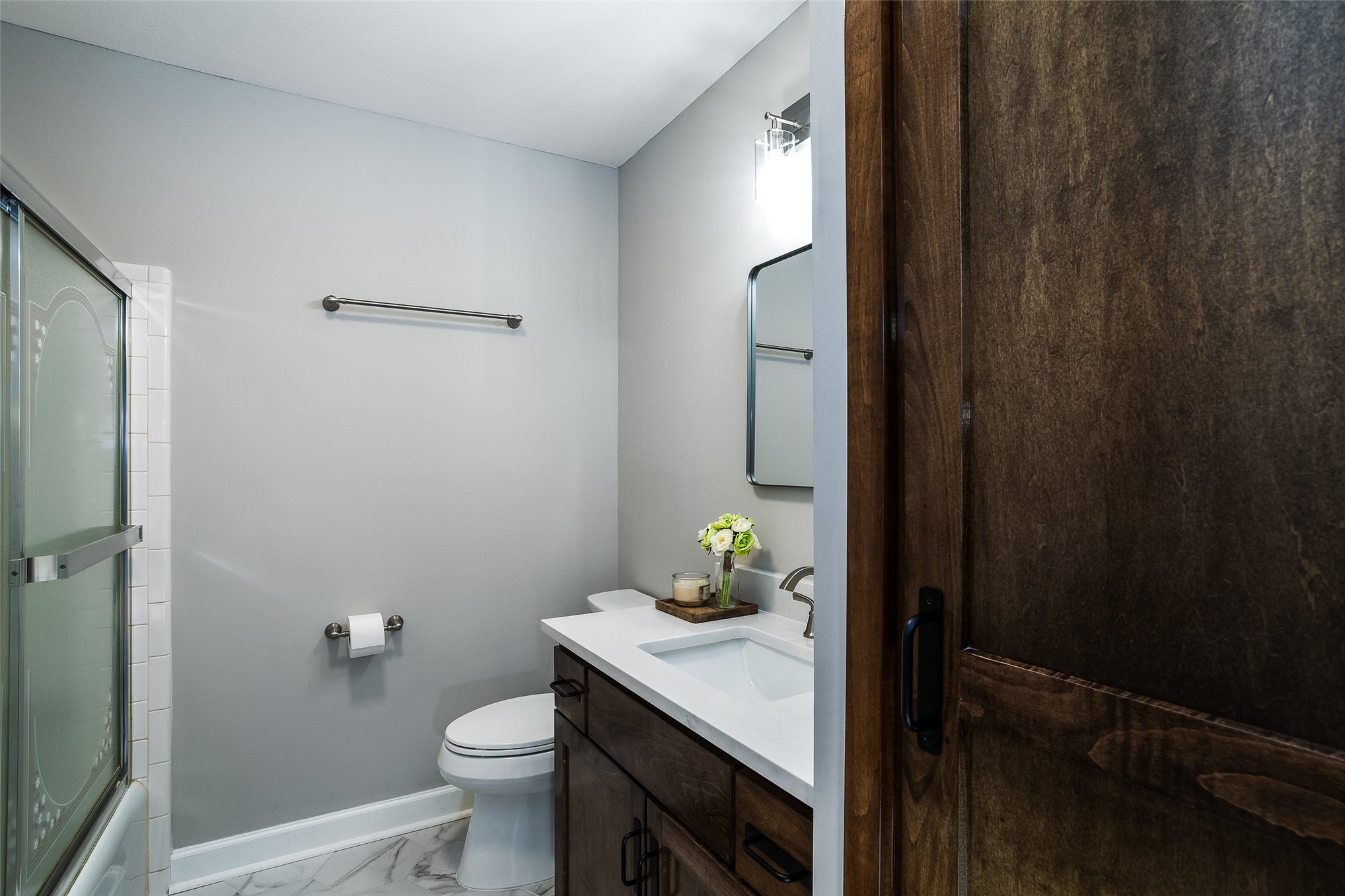 28175 Hammock Road Hilliard, FL 32046 - Photo 30 of 33 a bathroom with a granite countertop sink and a toilet