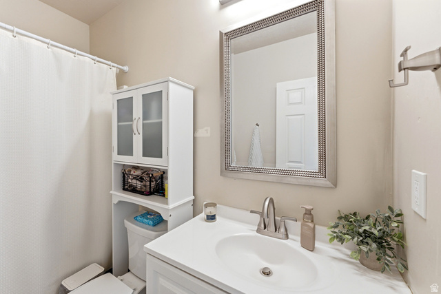 1434 West Stable Street Lindon, UT 84042 - Photo 43 of 76 Bathroom with vanity and a shower with curtain