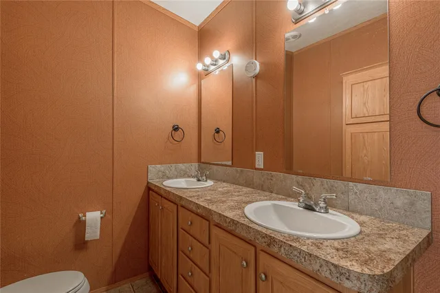 a bedroom with furniture and a fireplace